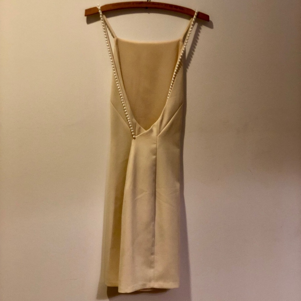 Beautiful open back pearl cream dress